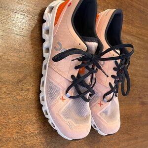 On Cloud Running Coral and Black Sneakers